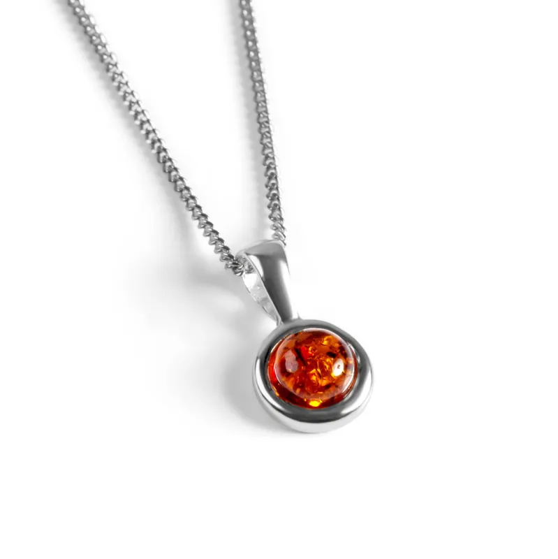 Round Charm Necklace in Silver and Cognac Amber sold by Henryka