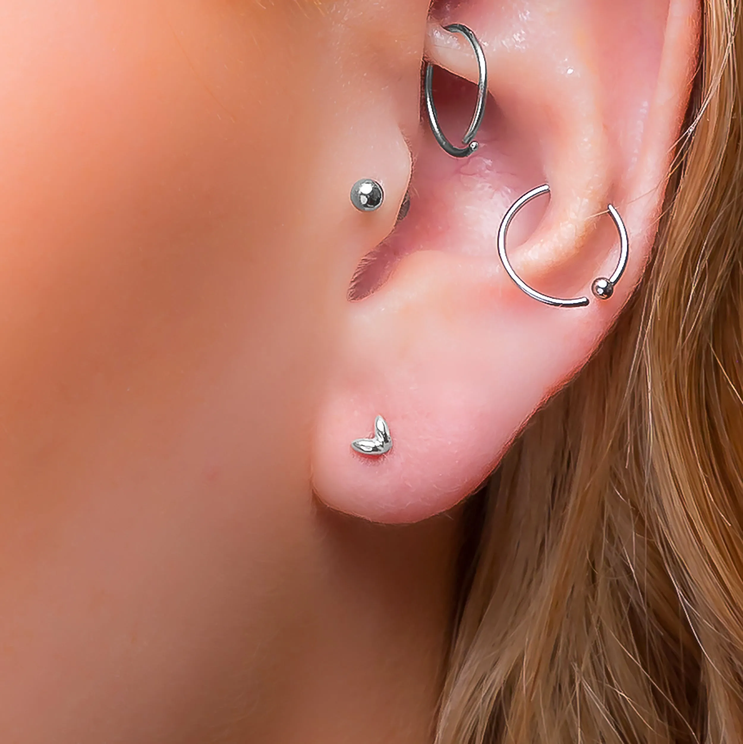 Tiny Double Leaf Stud Earrings in Silver sold by Henryka product image thumbnail 2