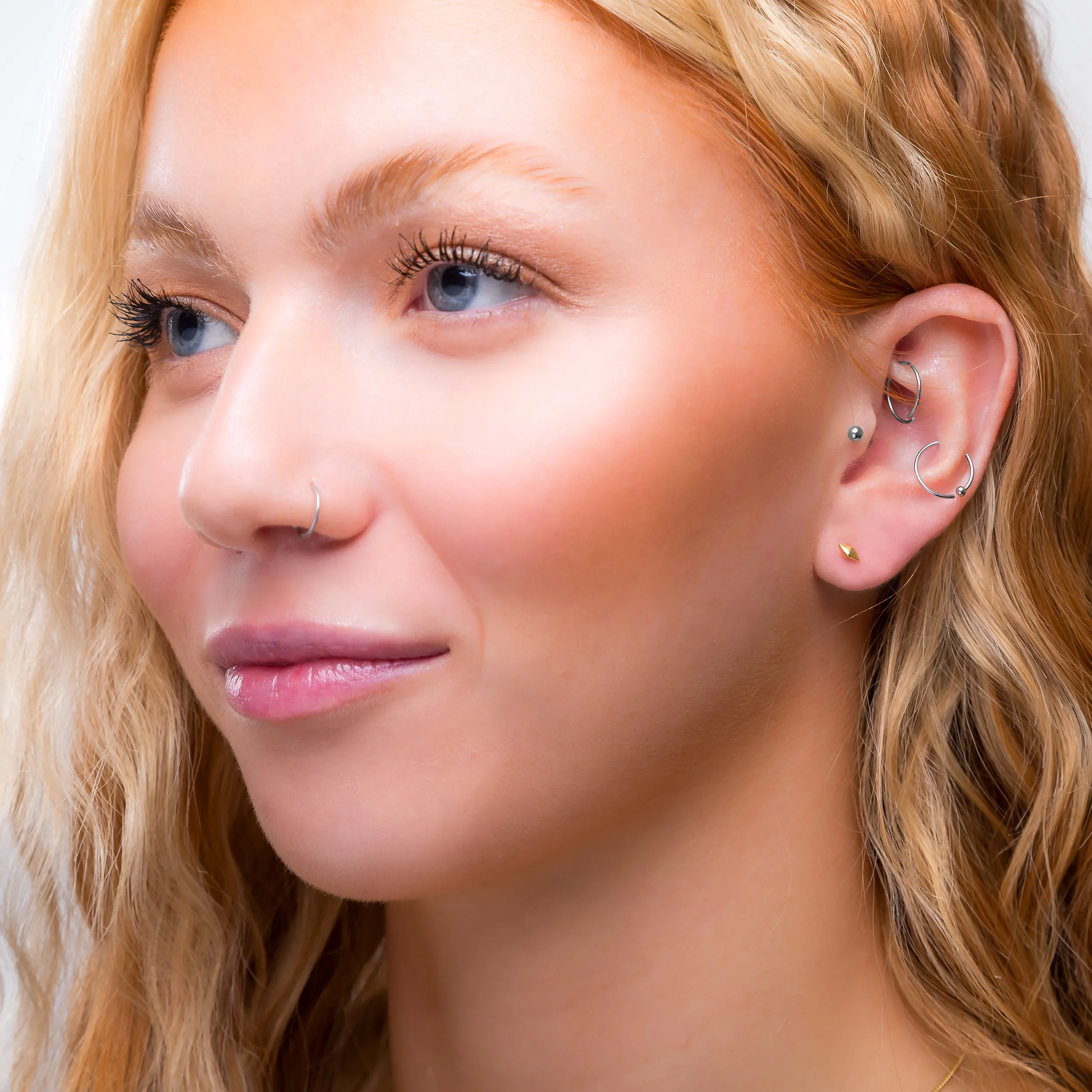 Tiny Rhombus Stud Earrings in Silver with 24ct Gold sold by Henryka product image thumbnail 3