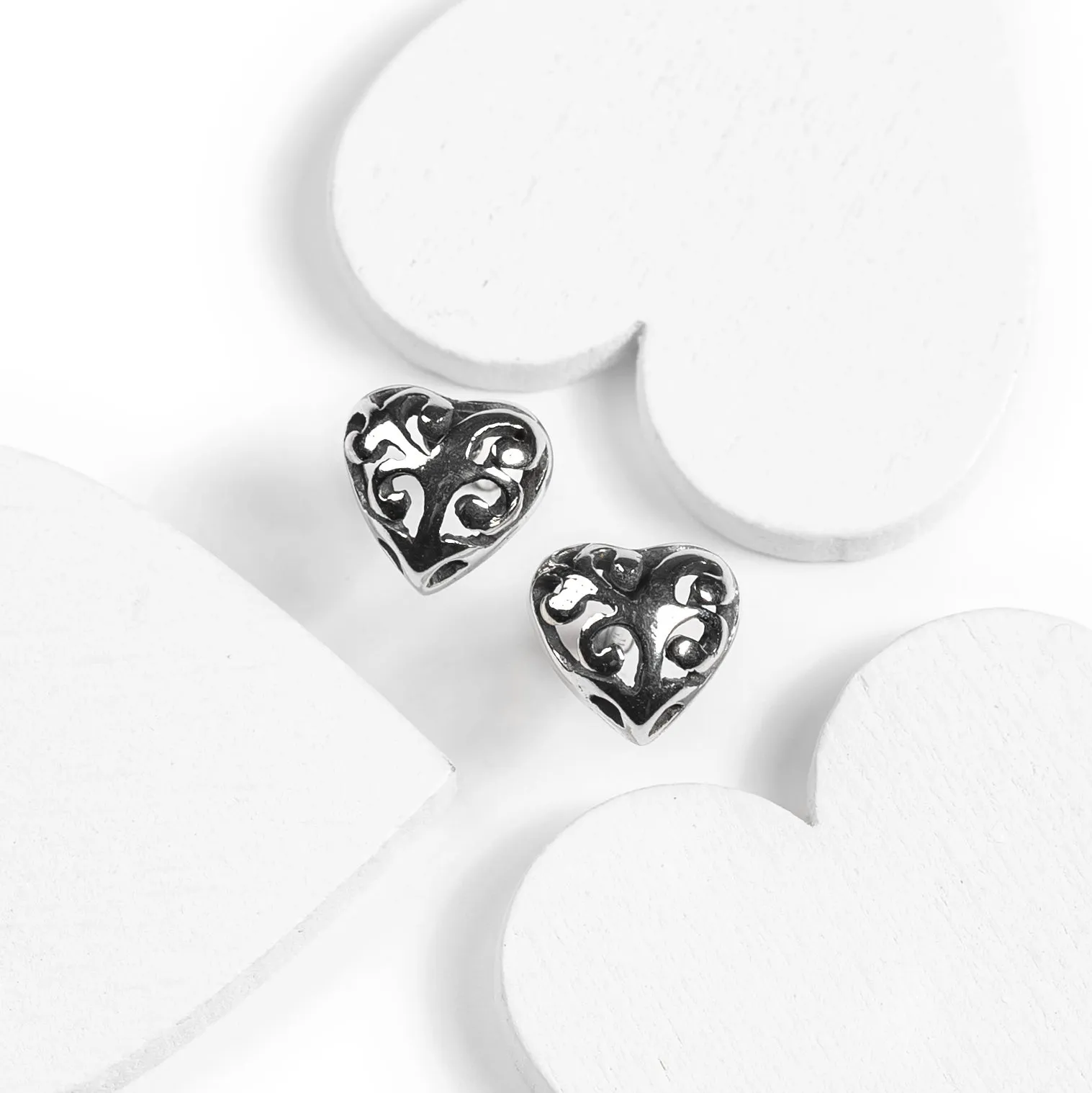 Decorative Heart Stud Earrings in Silver sold by Henryka product image thumbnail 4