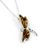 Golden Dragonfly Necklace in Silver and Amber sold by Henryka