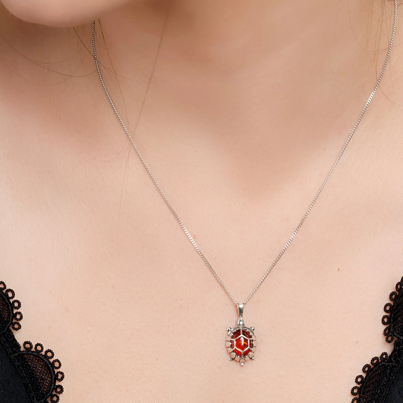 Turtle / Tortoise Necklace in Silver and Cognac Amber sold by Henryka product image thumbnail 2