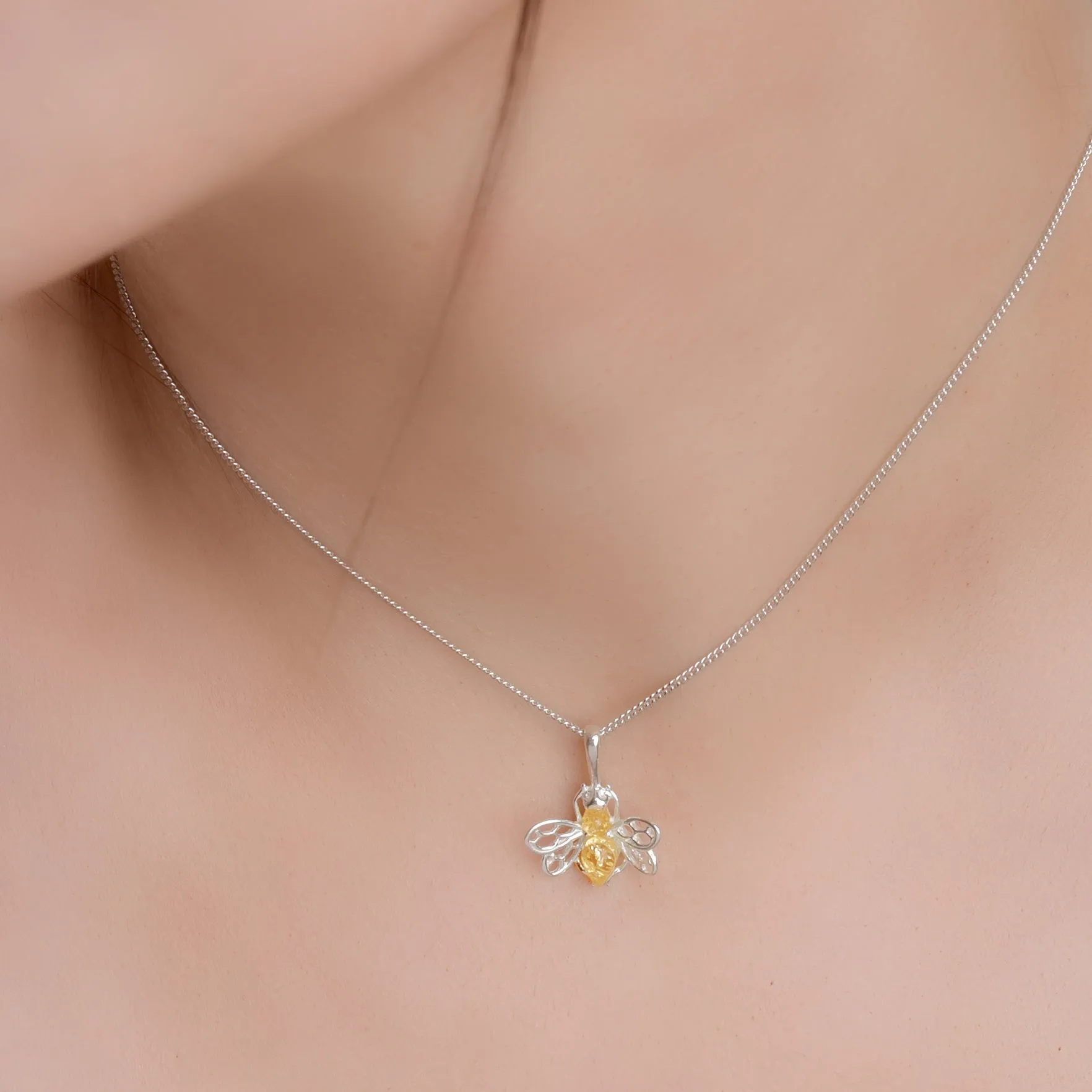 Tiny Honey Bee Necklace in Silver and Yellow Amber sold by Henryka product image thumbnail 3