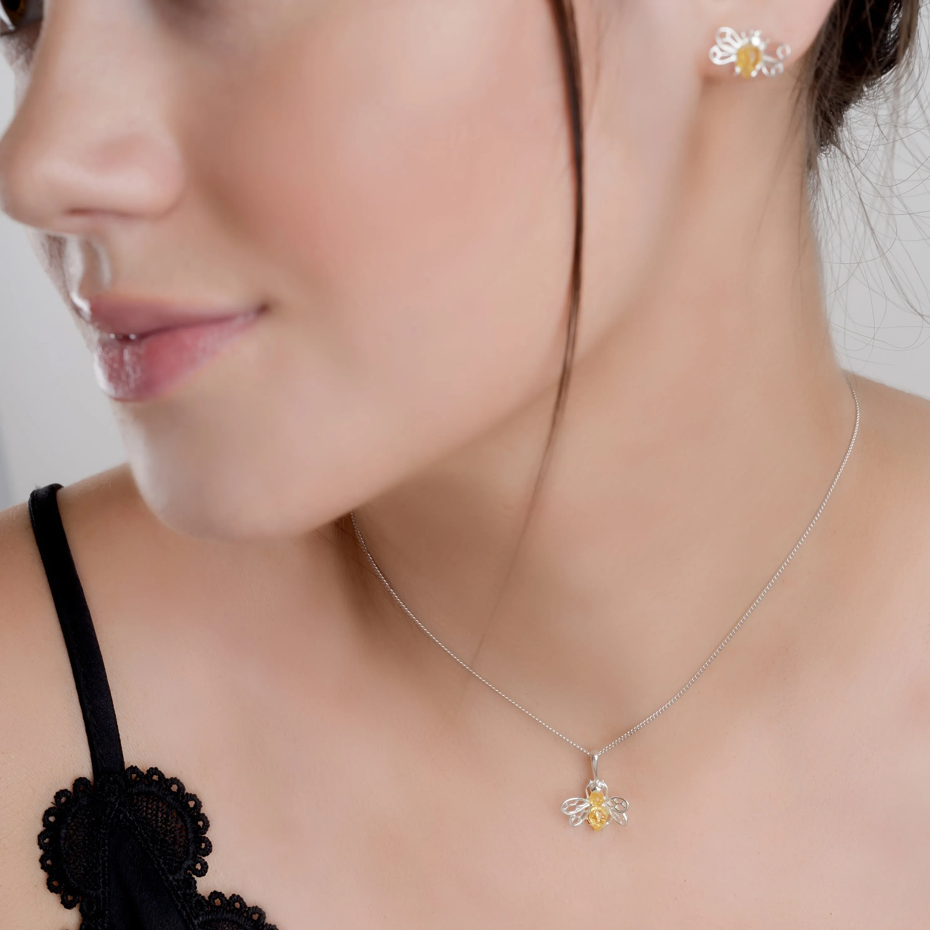 Tiny Honey Bee Necklace in Silver and Yellow Amber sold by Henryka product image thumbnail 2