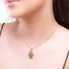 Hamsa Hand Necklace in Silver with 24ct Gold & Turquoise sold by Henryka