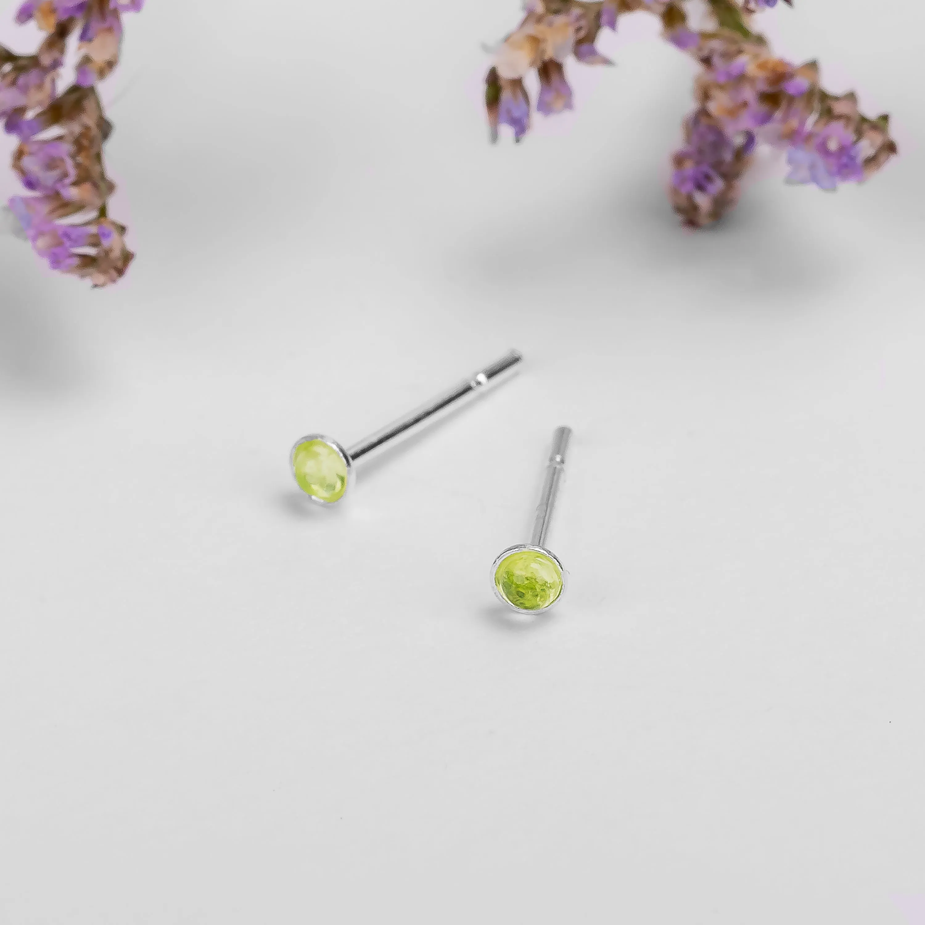 Teeny Tiny Round Stud Earrings in Silver and Peridot sold by Henryka product image thumbnail 2