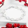 Classic Teardrop Link Bracelet in Silver and Moonstone sold by Henryka