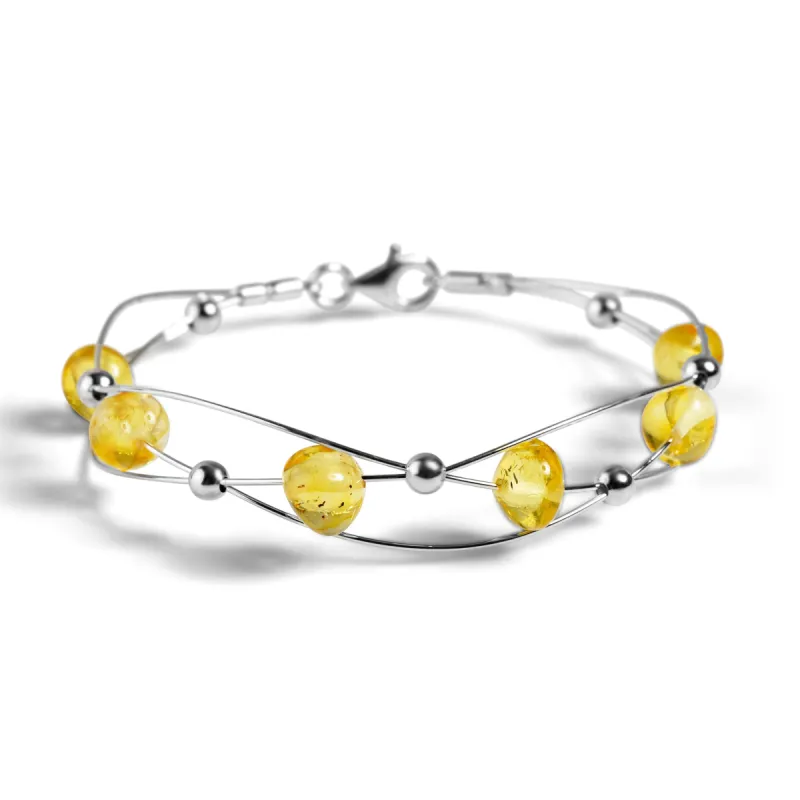 Weaved Bangle in Silver and Yellow Amber sold by Henryka