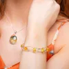 Weaved Bangle in Silver and Yellow Amber sold by Henryka