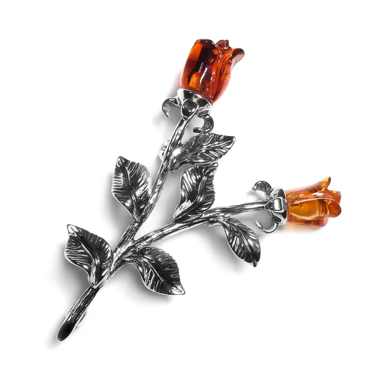 Double Rose Brooch in Silver and Cognac Amber sold by Henryka