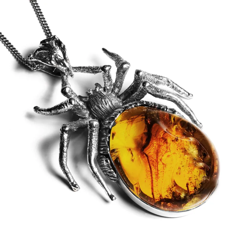 Spooky Handmade Spider Necklace in Silver and Untreated Amber sold by Henryka