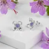 Small Lilac Flower Stud Earrings in Silver & Tanzanite sold by Henryka