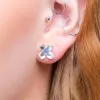 Small Lilac Flower Stud Earrings in Silver & Tanzanite sold by Henryka