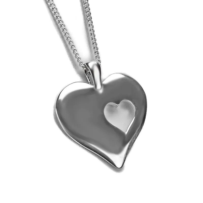 Cut Out Heart Necklace in Silver sold by Henryka