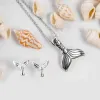 Small Mermaid Tail / Whale Necklace in Silver sold by Henryka