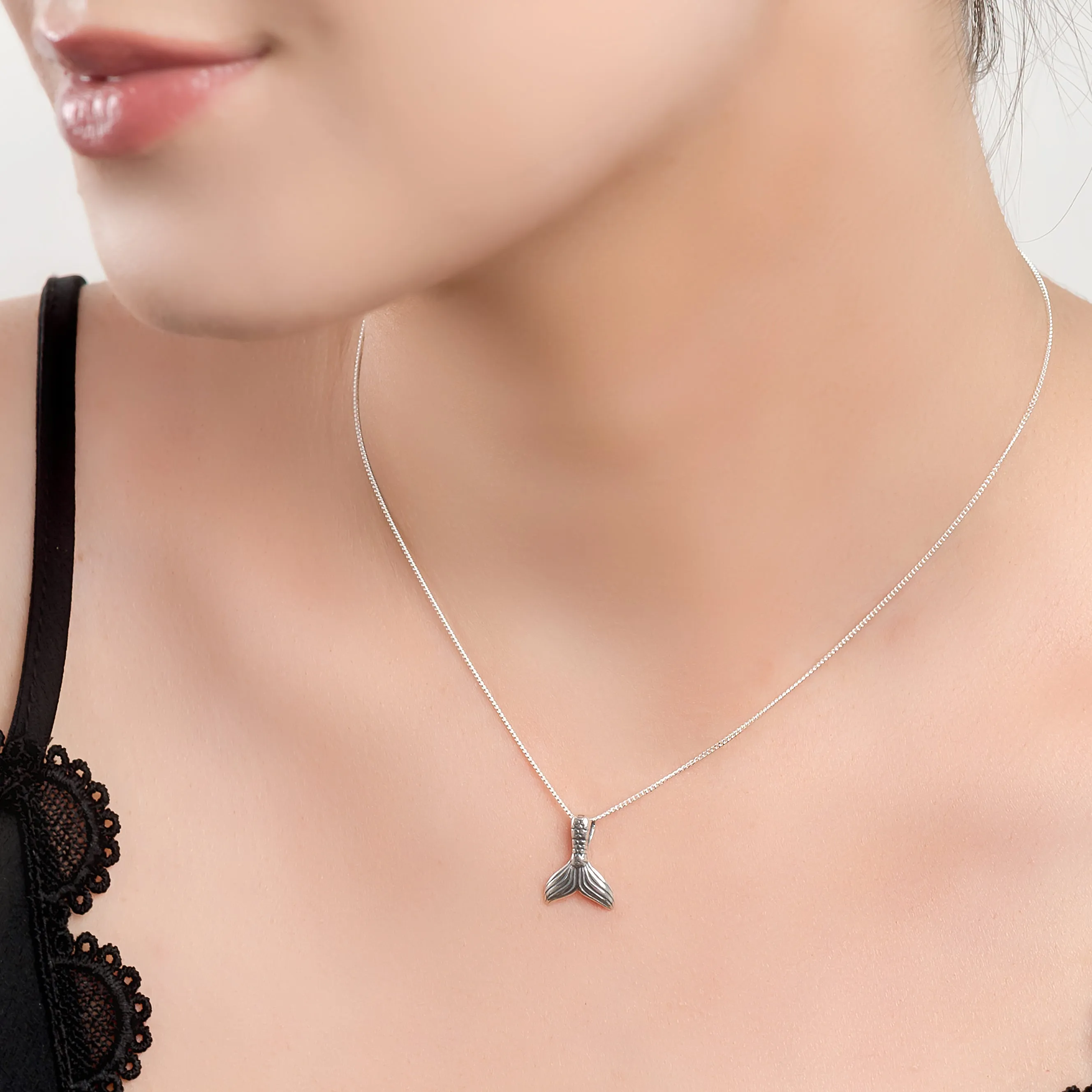 Small Mermaid Tail / Whale Necklace in Silver sold by Henryka product image thumbnail 2