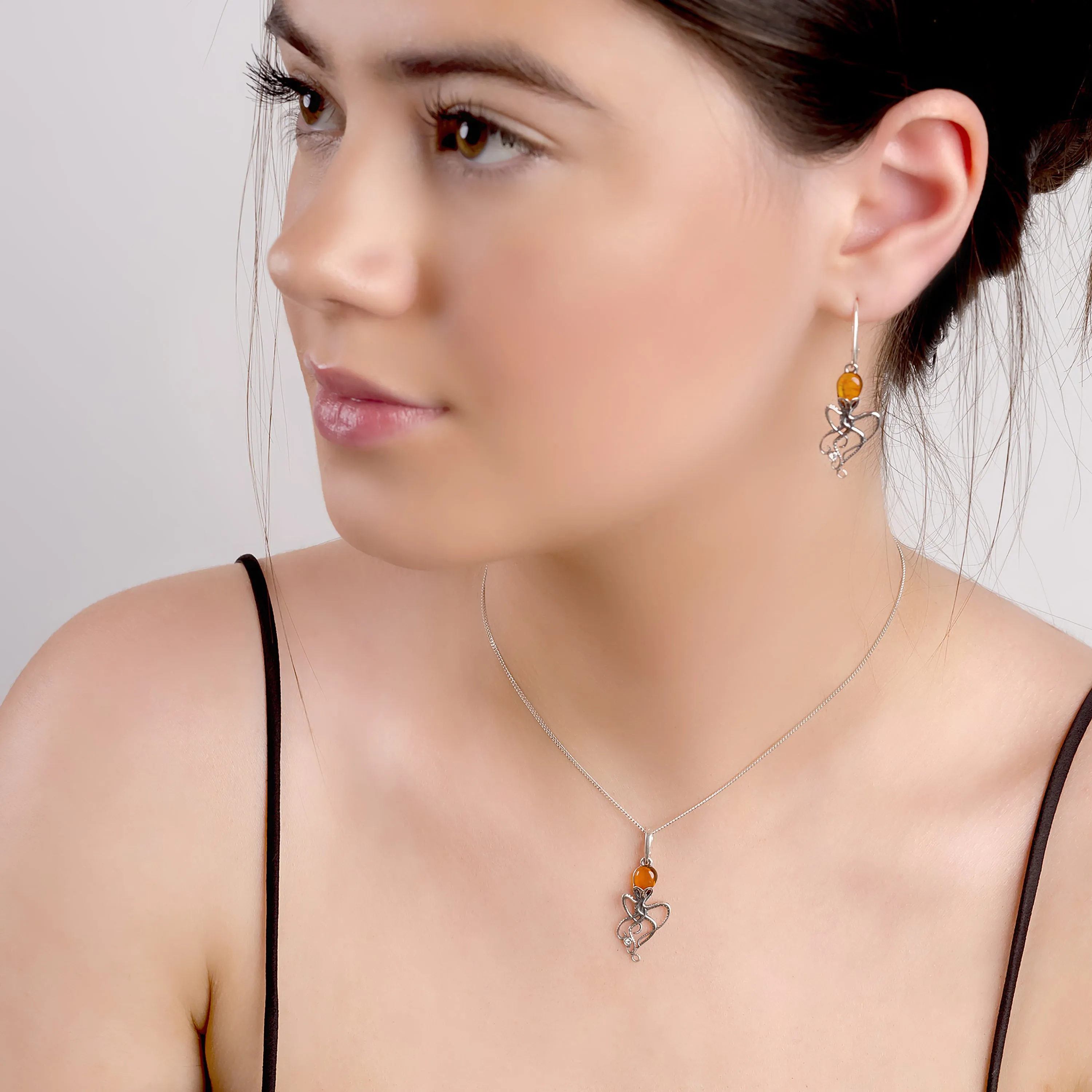 Octopus Necklace in Silver and Amber sold by Henryka product image thumbnail 3