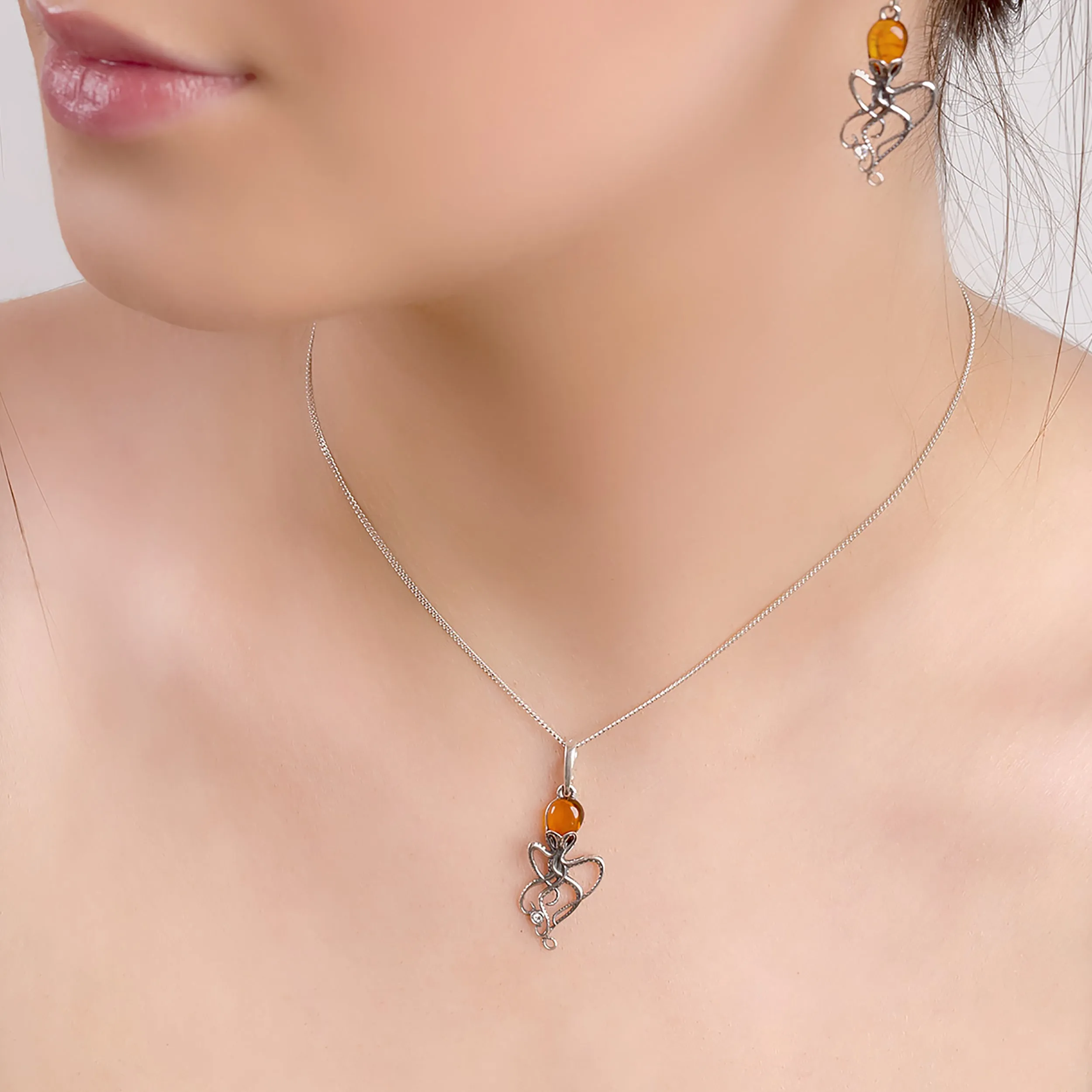 Octopus Necklace in Silver and Amber sold by Henryka product image thumbnail 2