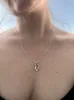 Maya Organic Shaped Oval Pendant Necklace Silver sold by Ivalo.com