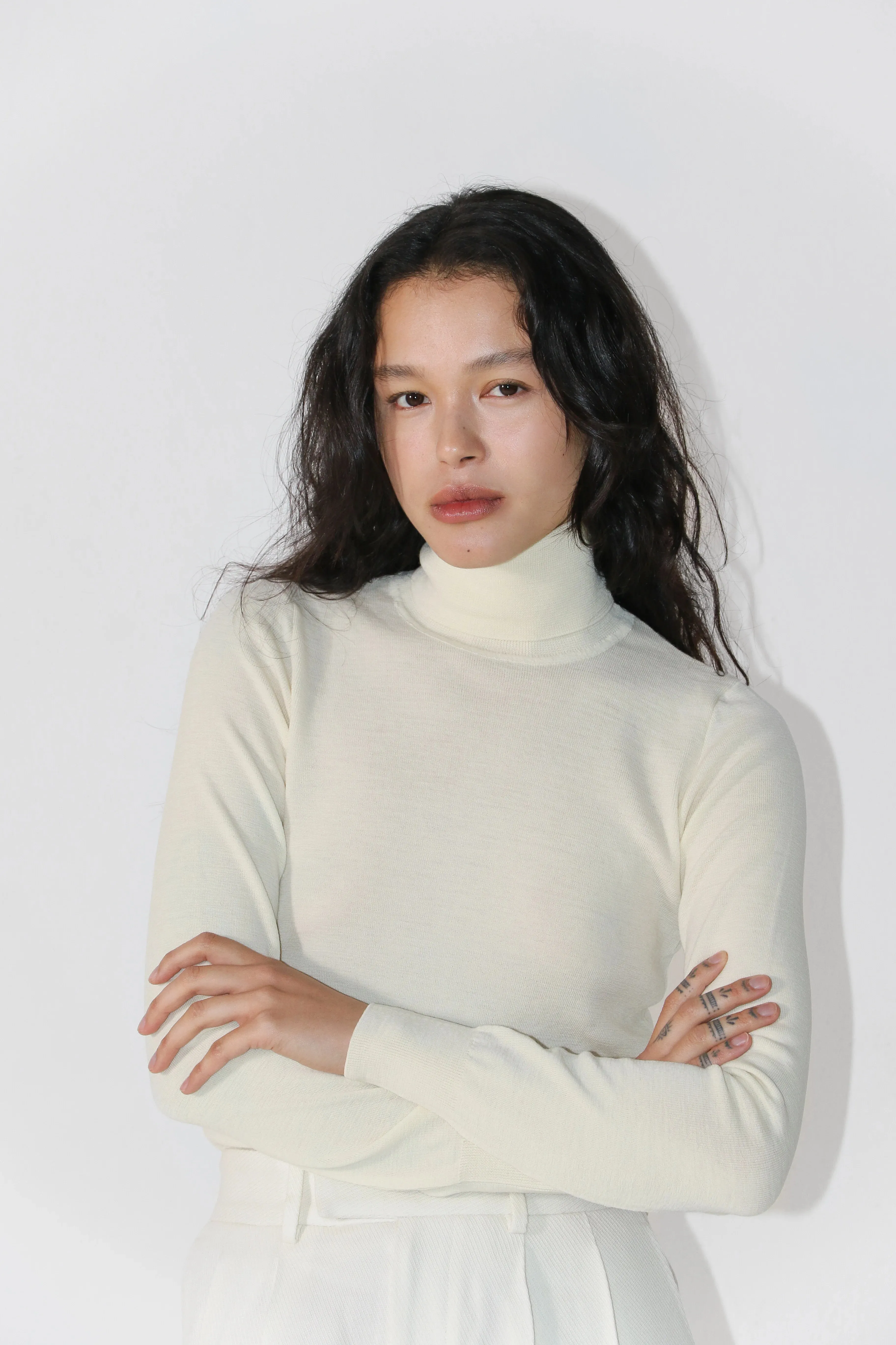 Merino Turtle Neck Knit Cream sold by Ivalo.com