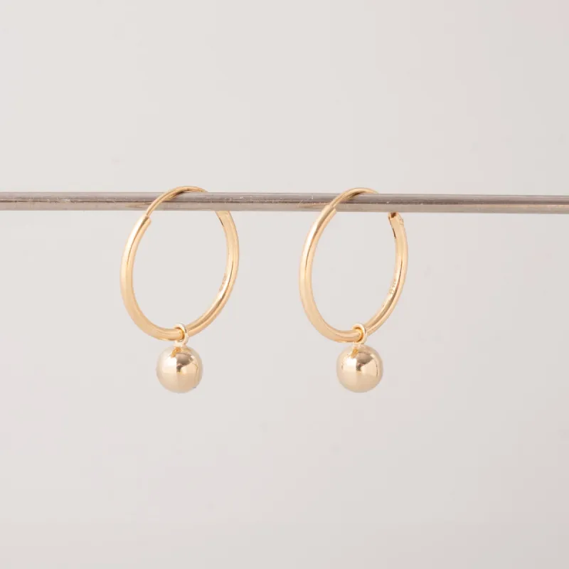 Charms Ball Hoop Earrings made by Ivalo.com