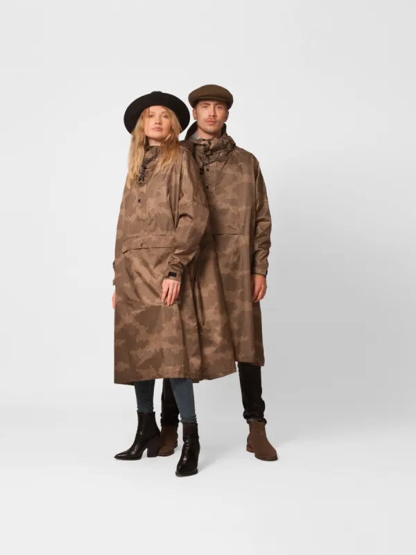 The Clouds Rain Poncho sold by Ivalo.com