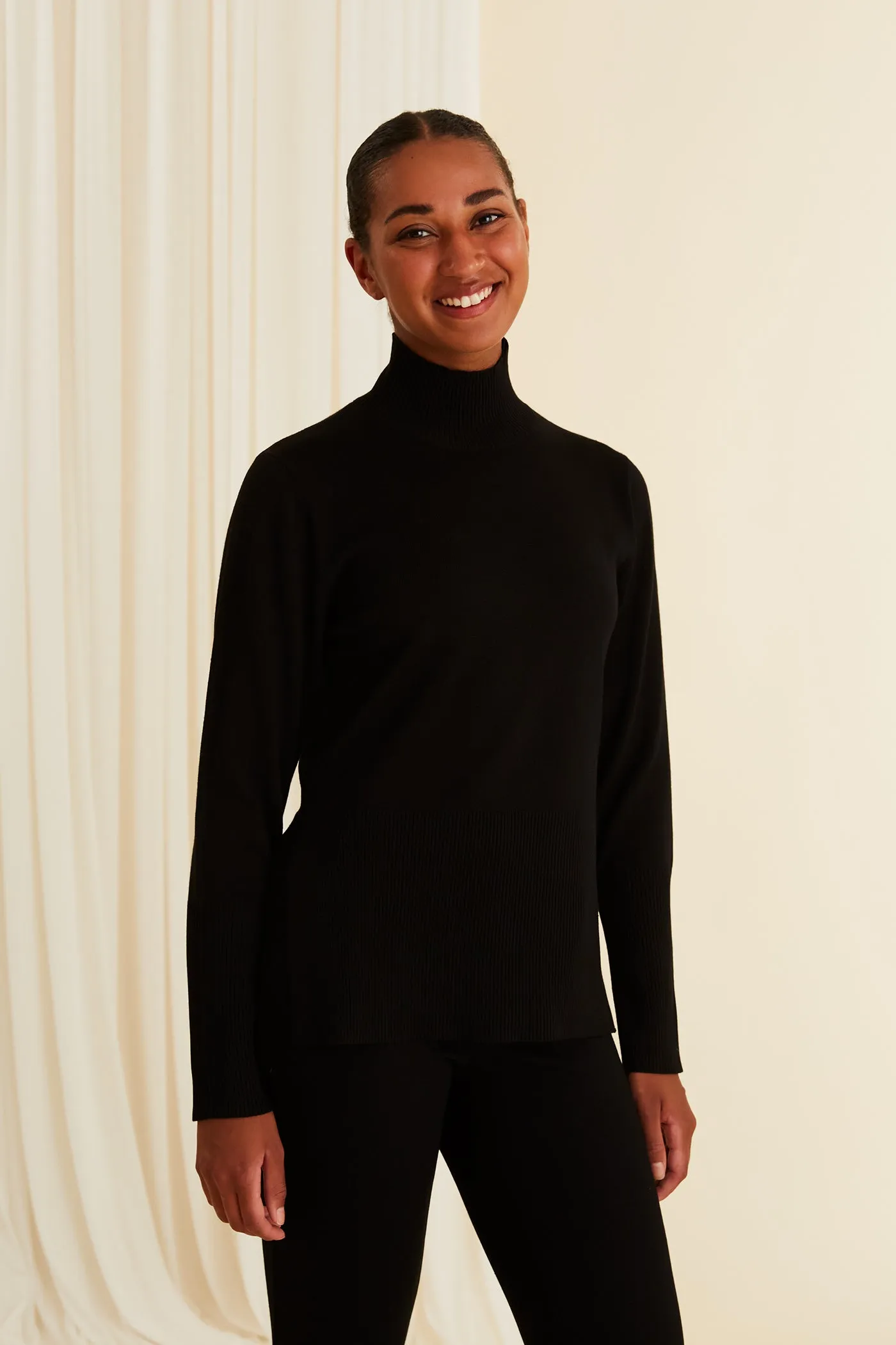 Maxine High Neck Jumper Black sold by Ivalo.com
