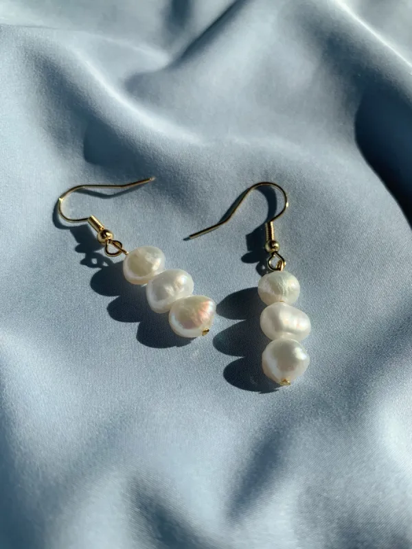 Droplets White Earrings sold by Ivalo.com