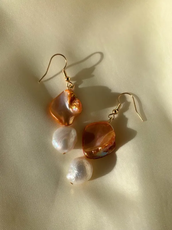 Waves Coral Earrings sold by Ivalo.com