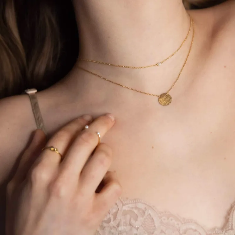 Satin Disc Necklace sold by Ivalo.com