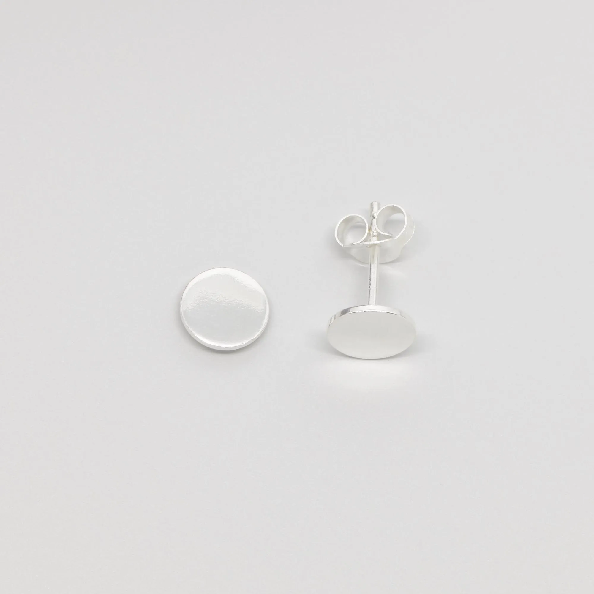 Shiny Disc Stud Earrings sold by Ivalo.com