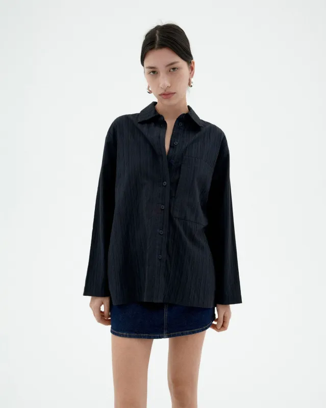 Marcelle Popcorn Blouse Navy sold by Ivalo.com