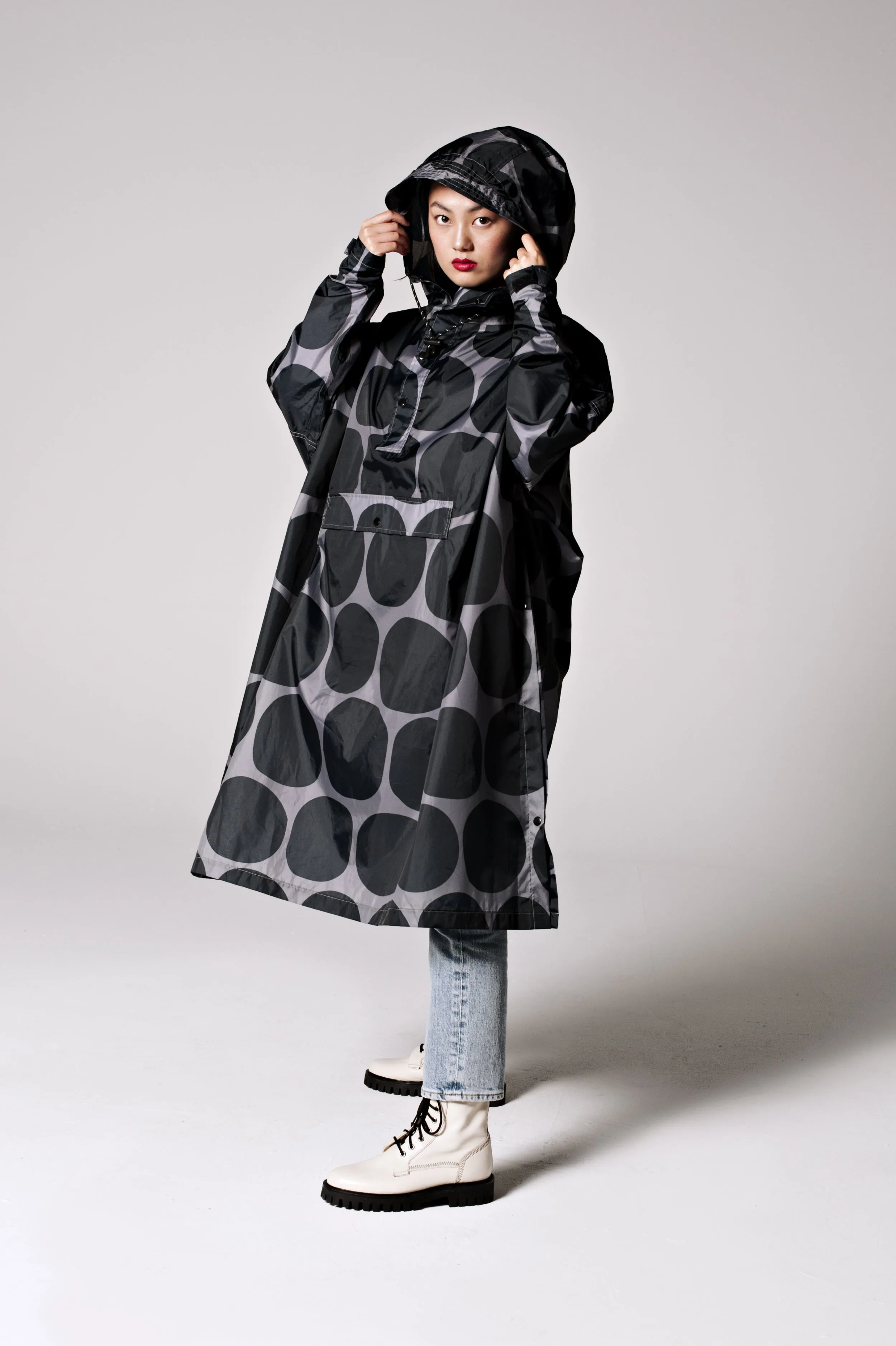 Black Polka Rain Poncho sold by Ivalo.com