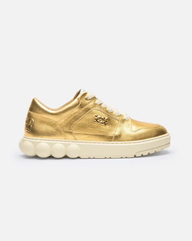Oyster Sneakers Gold sold by Ivalo.com