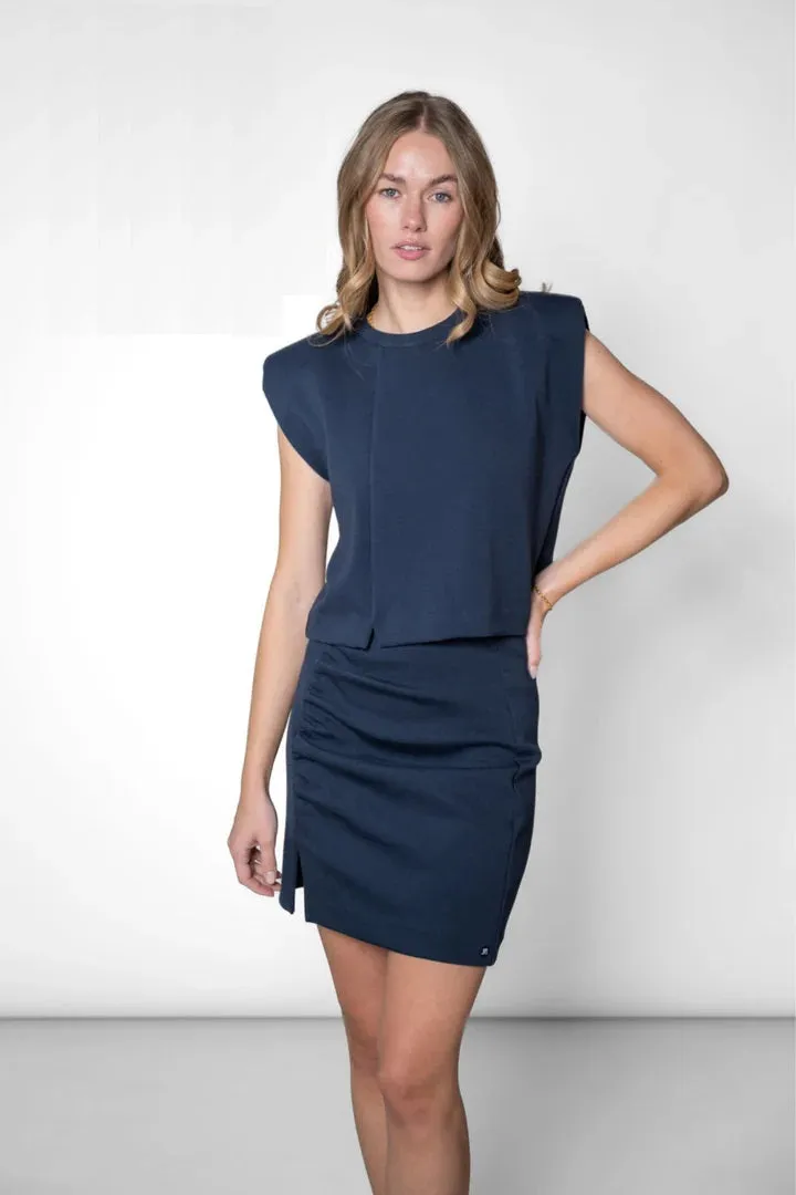 Interlock Top & Skirt Bundle Navy sold by Ivalo.com