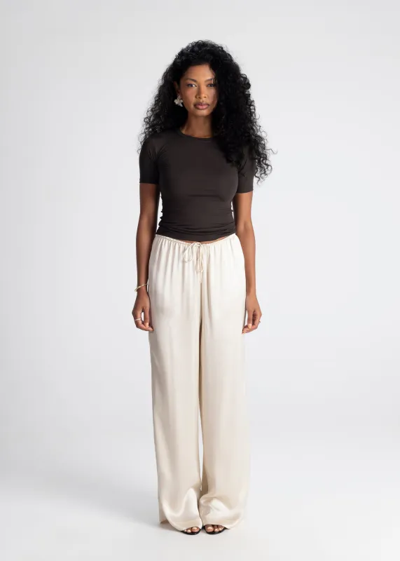 Giulia Loose Satin Pants Beige sold by Ivalo.com