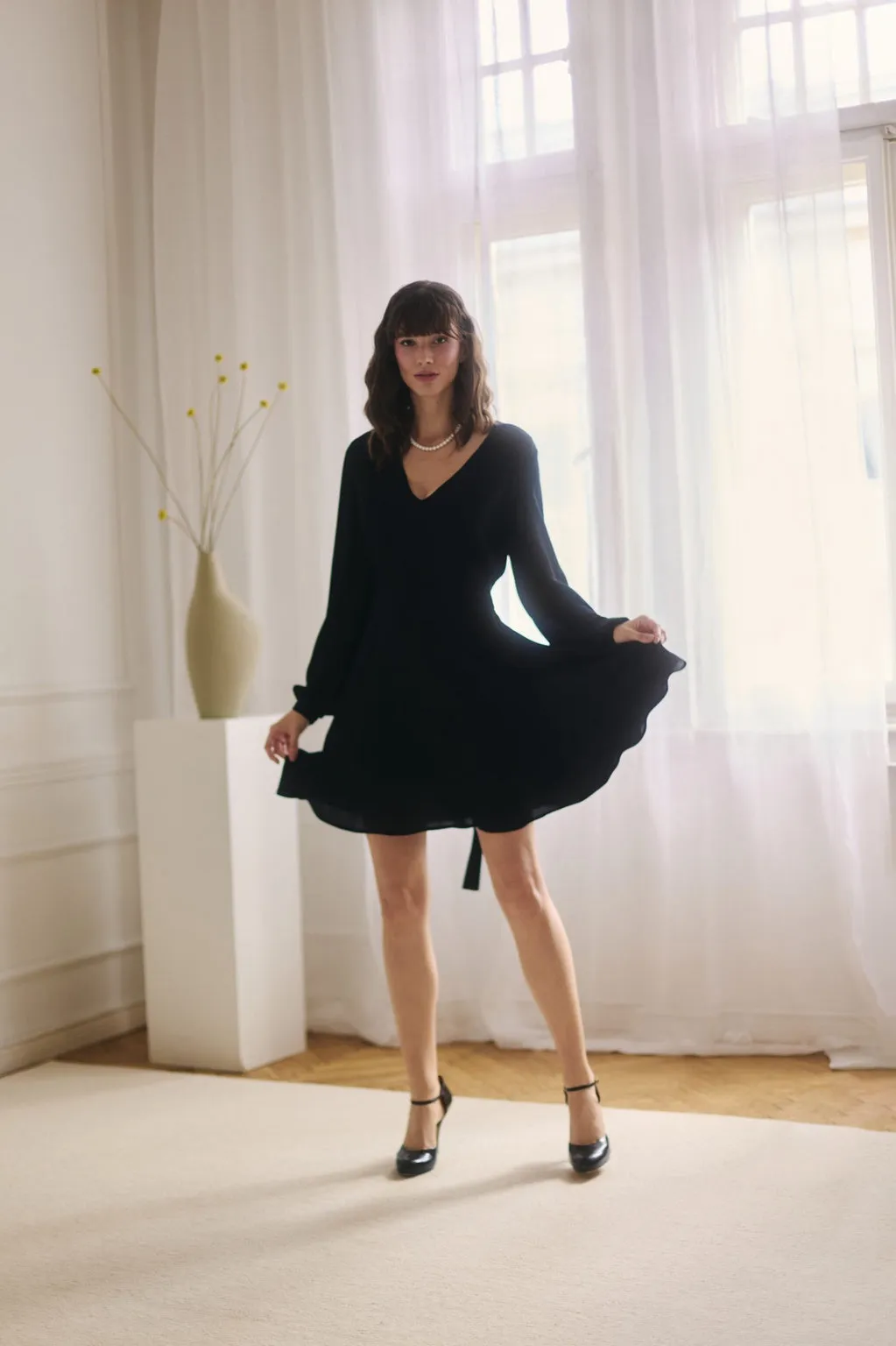 Charlene dress black sold by Ivalo.com