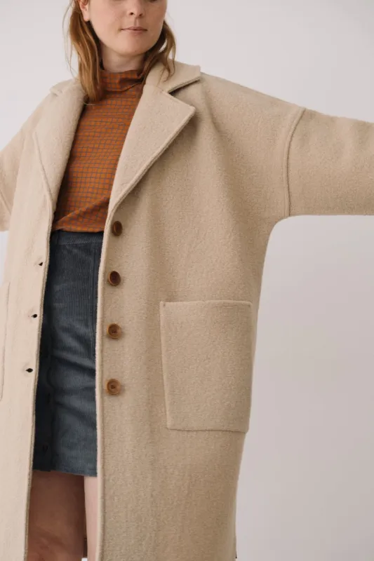 Merino Wool Long Coat in Beige sold by Ivalo.com