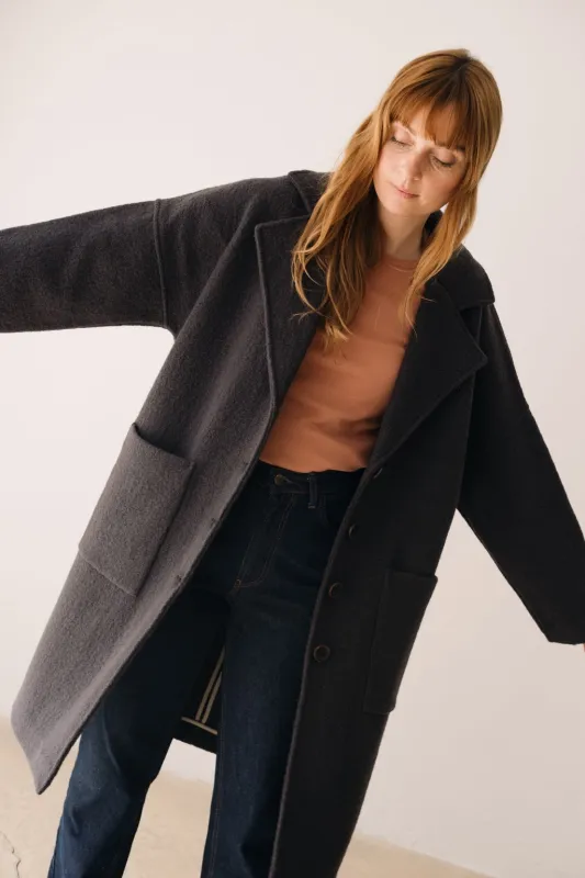 100% RWS Merino Wool Long Coat in Black sold by Ivalo.com