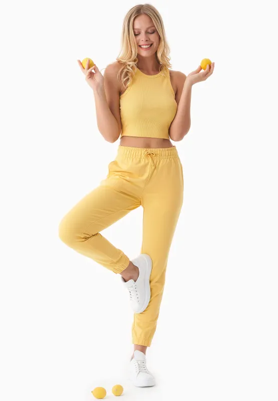 Peera Light Organic Cotton Sweatpants Saffron sold by Ivalo.com
