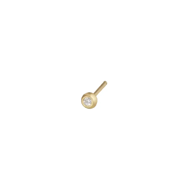 Ball stud earring in 14 karat gold with a 0.02 ct brilliant-cut diamond sold by Jane Koenig