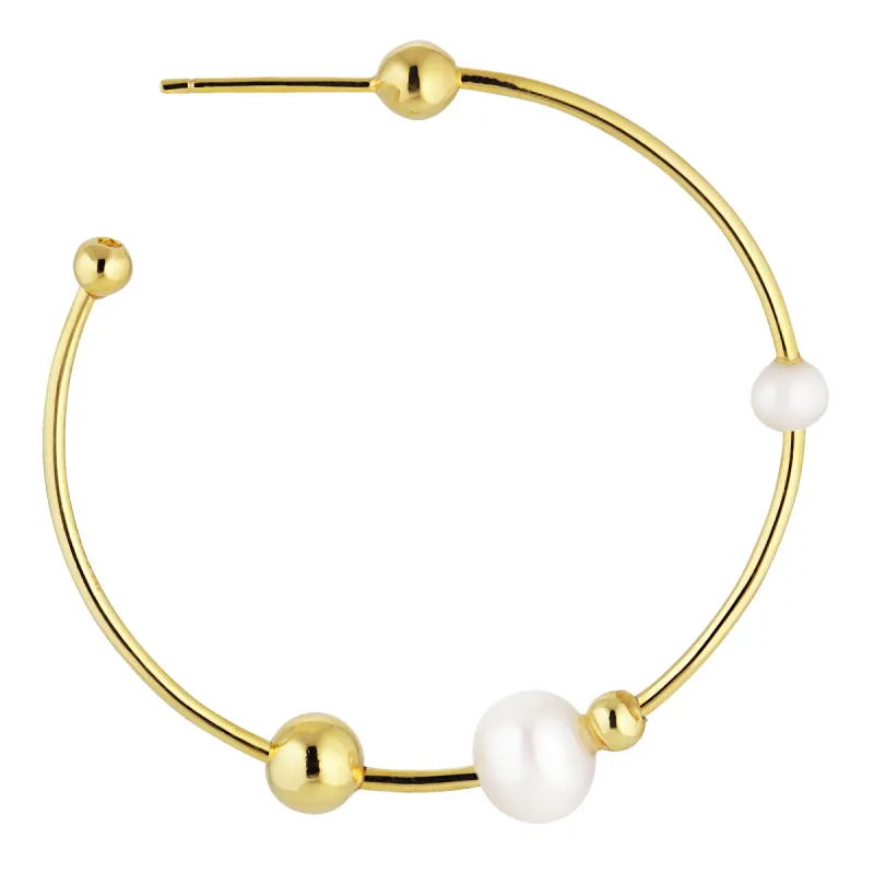 Big Atomic Pearl Hoop sold by Jane Koenig