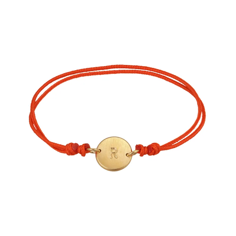 Red String Bracelet w. gold-plated Lovetag sold by Jane Koenig