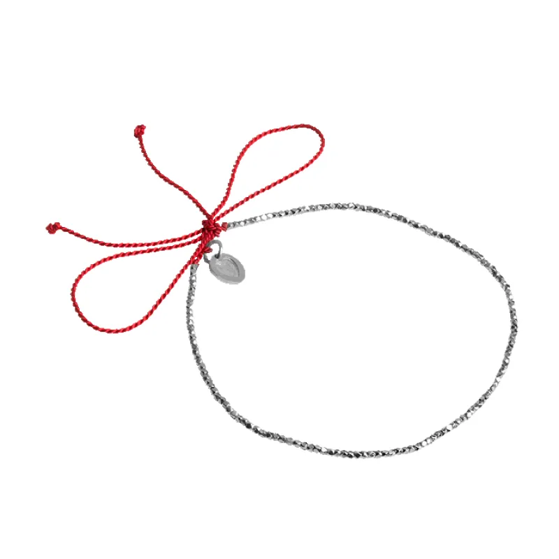 Wish Bracelet with Red Cord sold by Jane Koenig