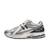 New Balance 1906R Silver Black sold by KeepItSneaker