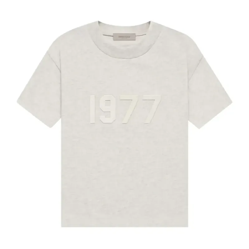 Fear of God Essentials 1977 Light Oatmeal T-shirt sold by KeepItSneaker