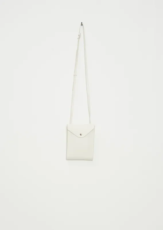 Envelope Strap Bag — Chalk sold by La Garconne