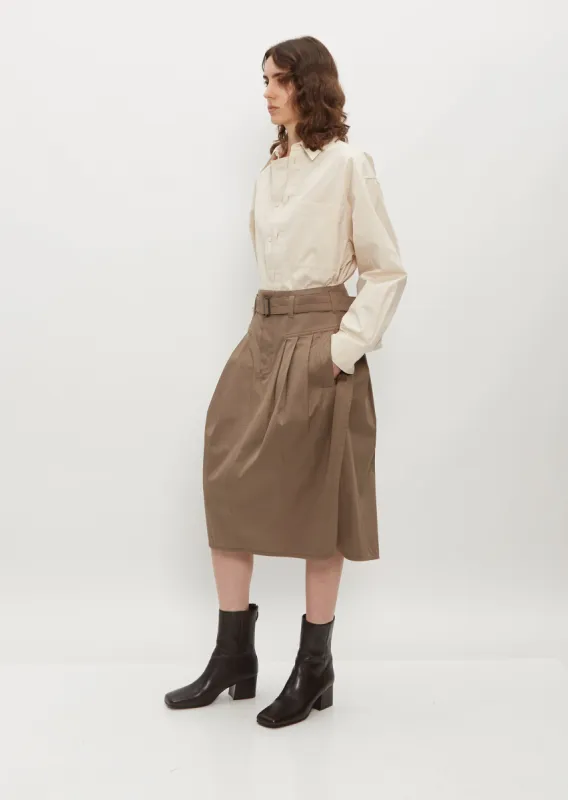 Pleated Belted Skirt sold by La Garconne