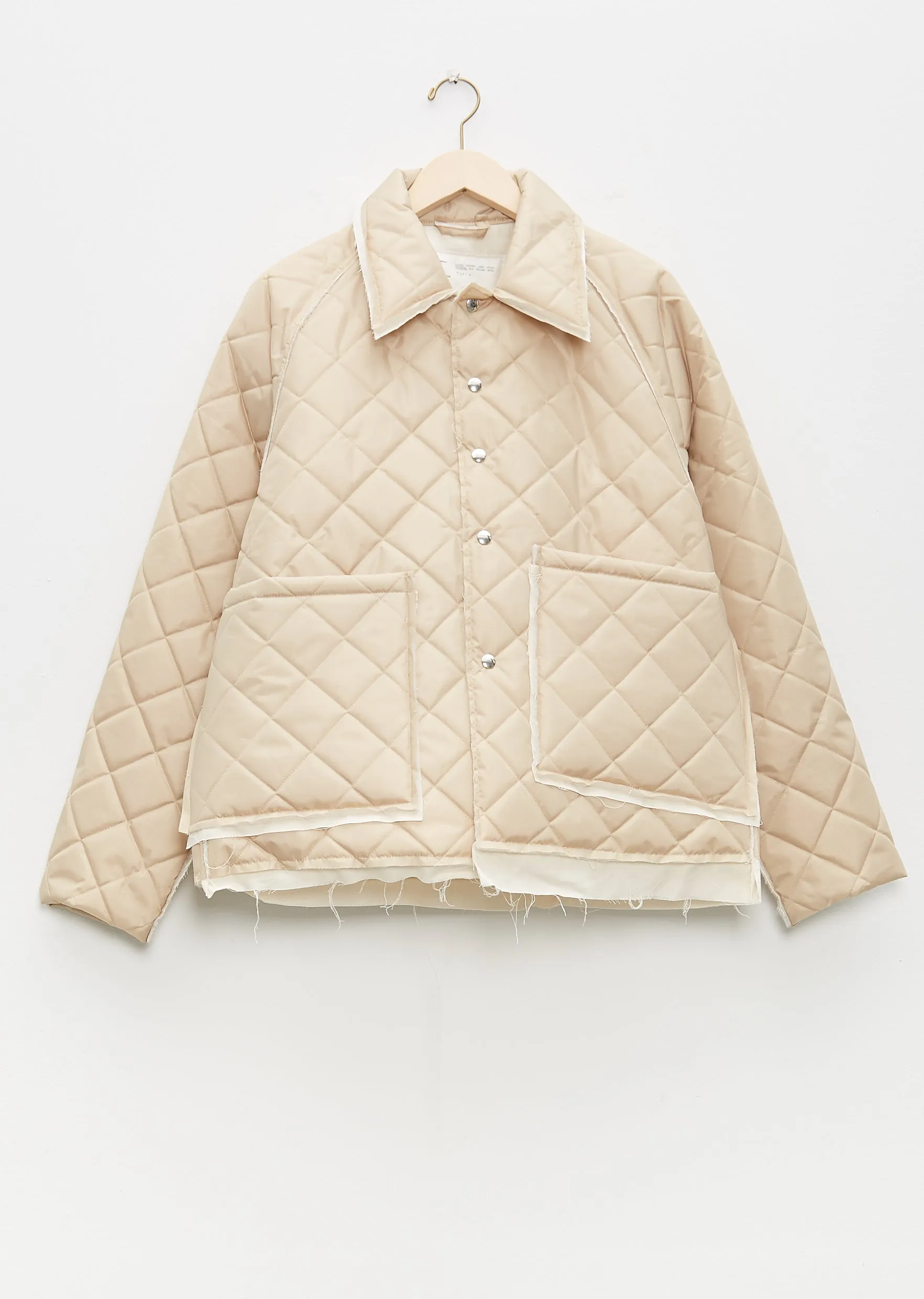 Padded Coach Jacket sold by La Garconne