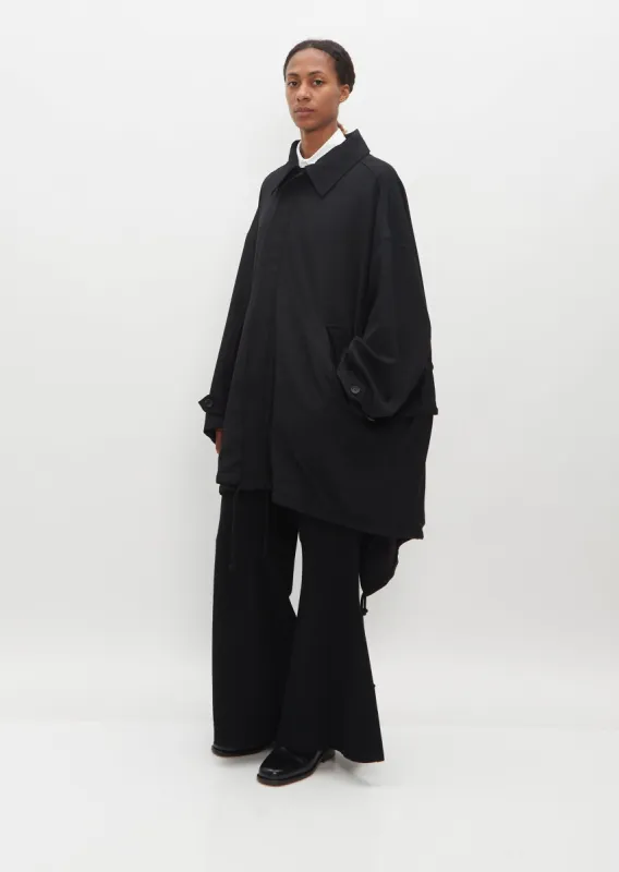 Layered Mods Coat sold by La Garconne